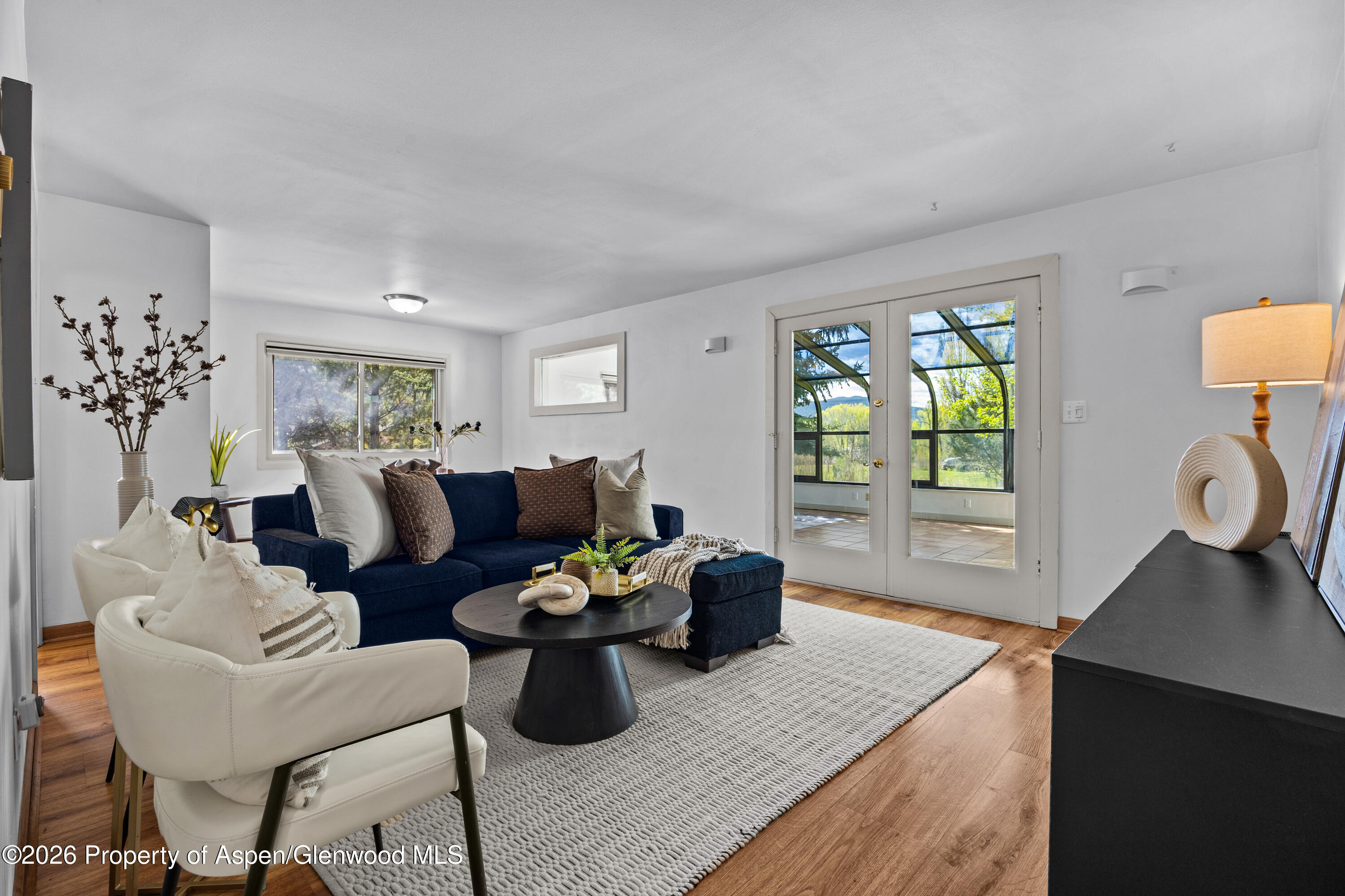 128 Hopi Carbondale, CO 81623 - Photo 8 of 34 a living room with furniture and wooden floor