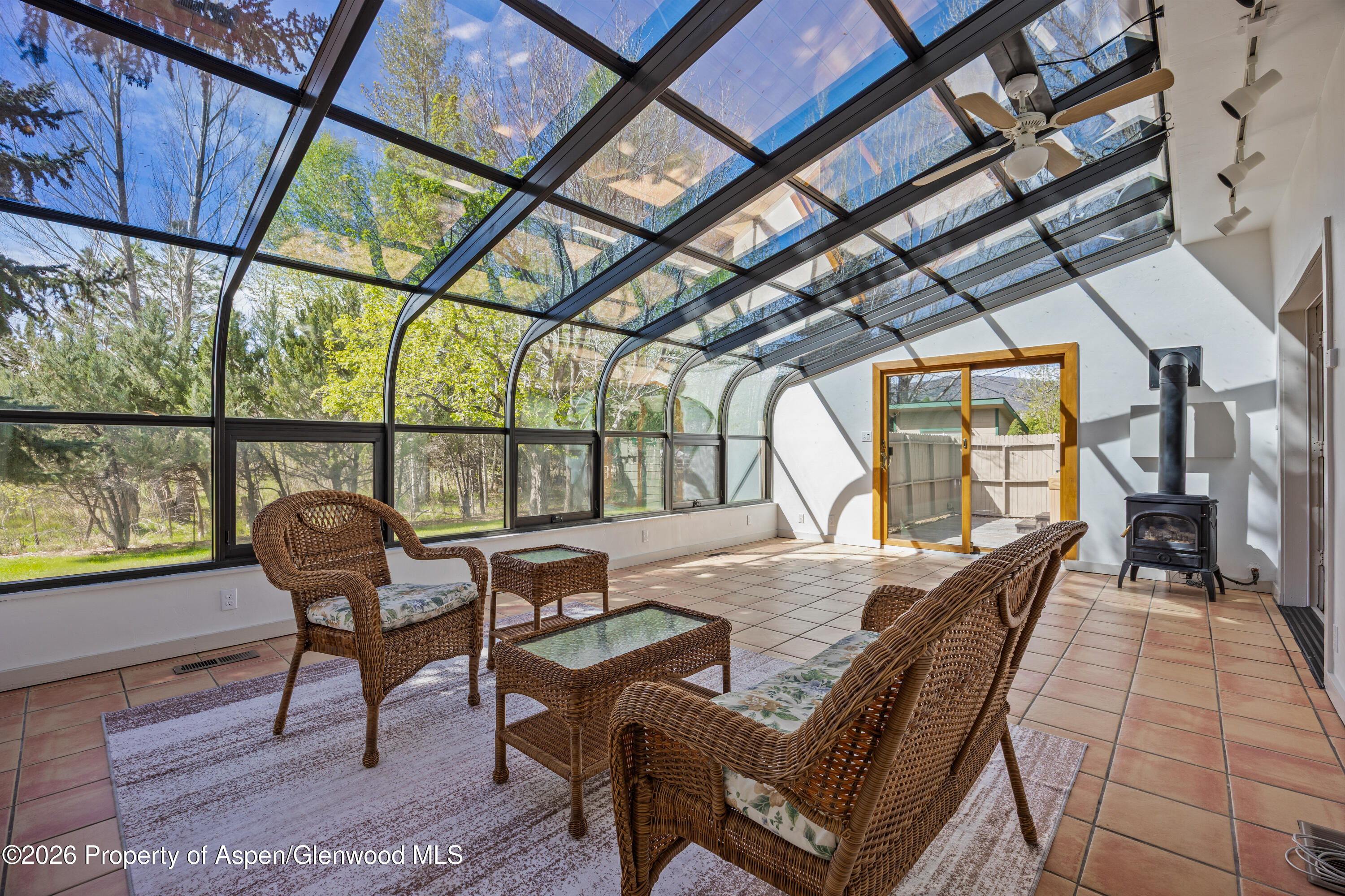 128 Hopi Carbondale, CO 81623 - Photo 9 of 34 a view of a dining room with furniture wooden floor and a potted plant