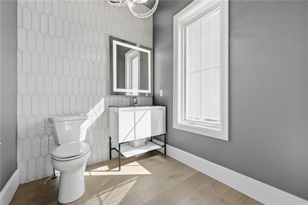 5133 Fifth Avenue Pittsburgh, PA 15232 - Photo 18 of 43 a bathroom with a sink and a toilet