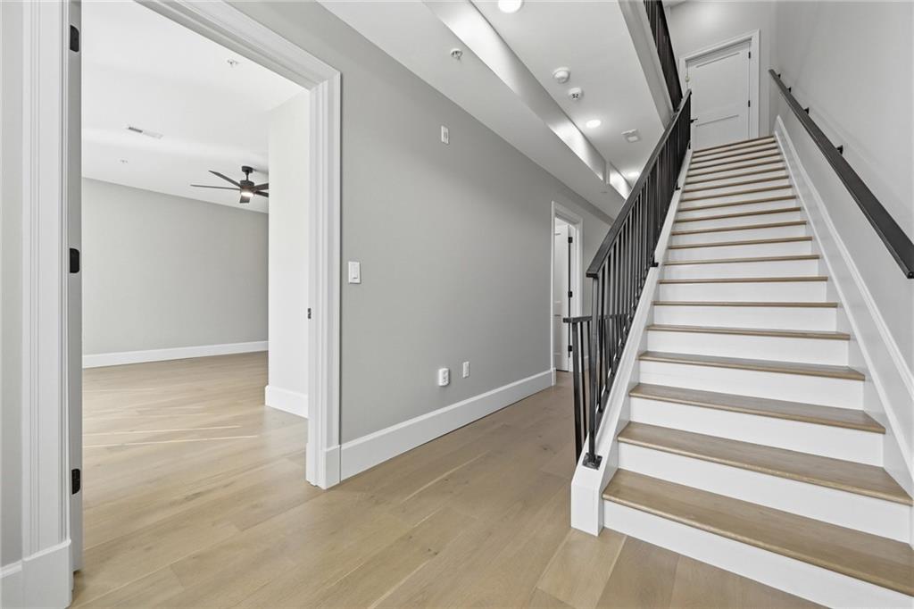 5133 Fifth Avenue Pittsburgh, PA 15232 - Photo 20 of 43 wooden floor in an empty room with wooden floor and entryway