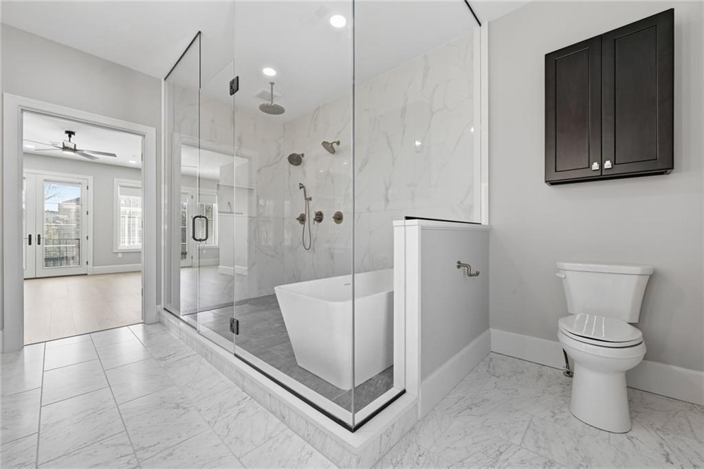 5133 Fifth Avenue Pittsburgh, PA 15232 - Photo 25 of 43 a bathroom with a sink a toilet and shower