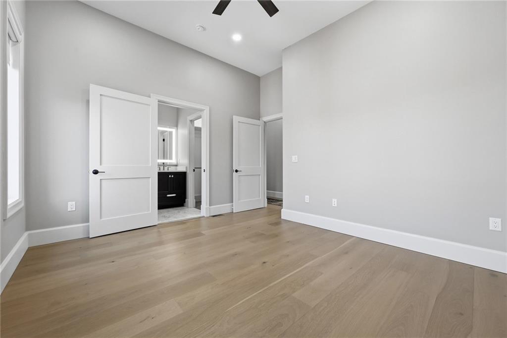 5133 Fifth Avenue Pittsburgh, PA 15232 - Photo 30 of 43 wooden floor in an empty room with a window