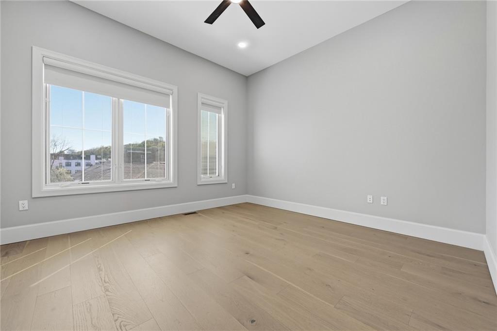 5133 Fifth Avenue Pittsburgh, PA 15232 - Photo 32 of 43 wooden floor in an empty room with a window