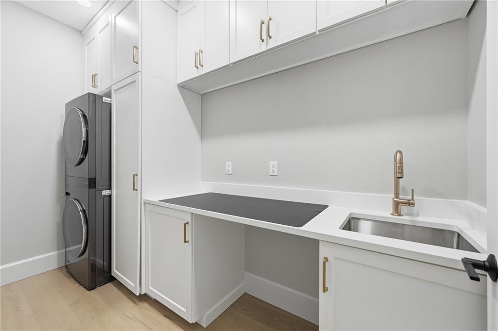 5133 Fifth Avenue Pittsburgh, PA 15232 - Photo 37 of 43 a kitchen with a sink and washing machine