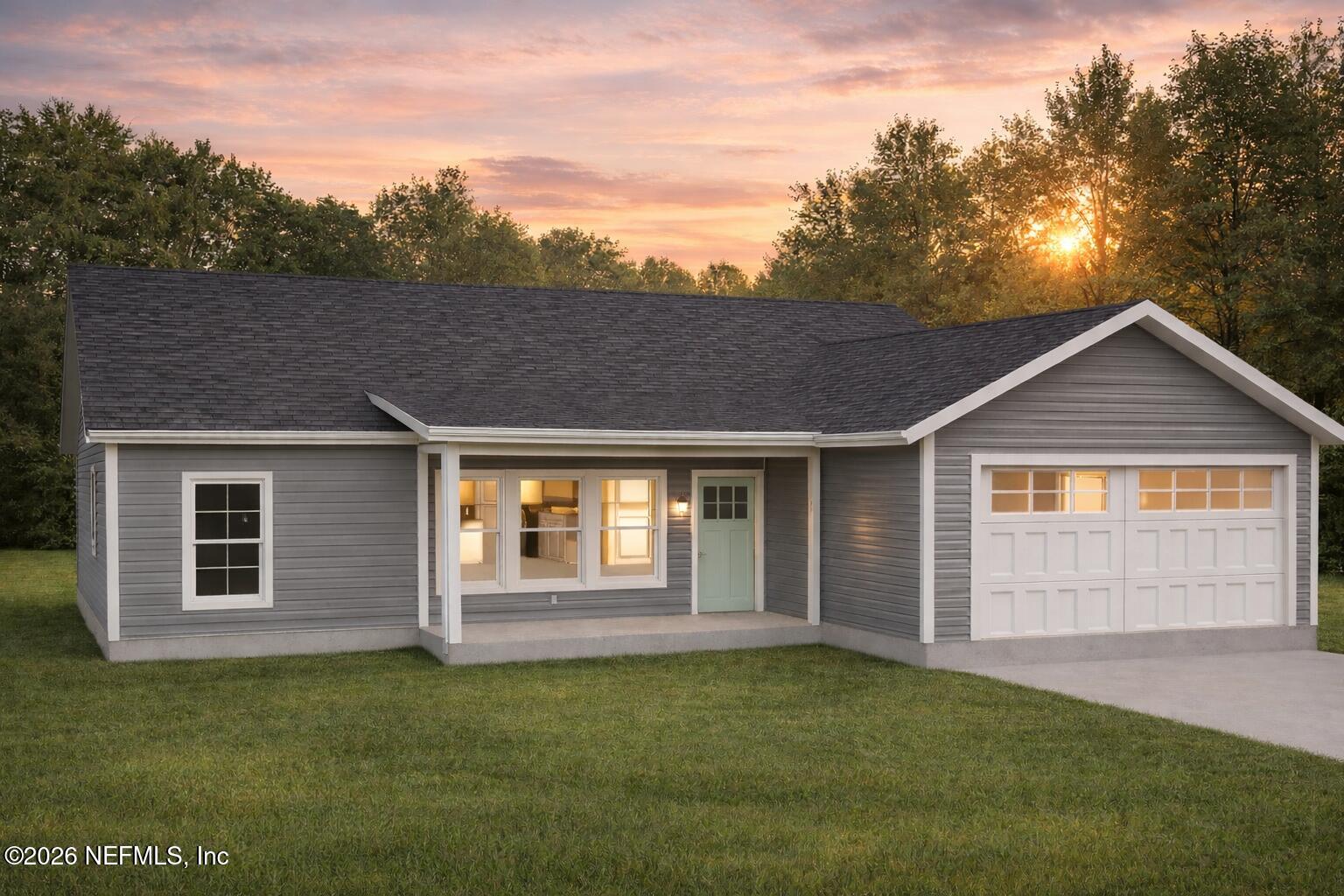 front view of a house with a yard