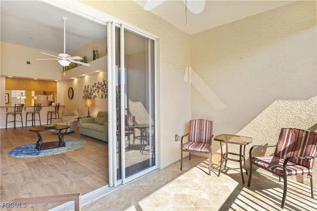 a view of a livingroom with furniture and a table