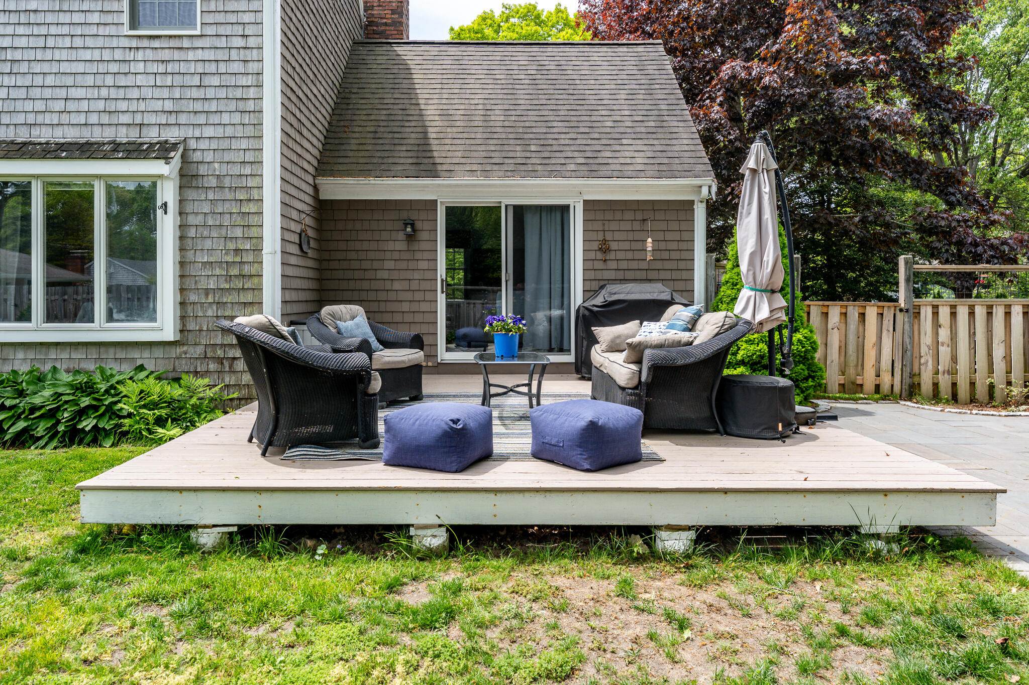 61 Angus Way Centerville, MA 02632 - Photo 47 of 59 a view of a house with backyard sitting area and garden