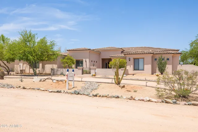 a view of a livingroom with furniture window and wooden floor