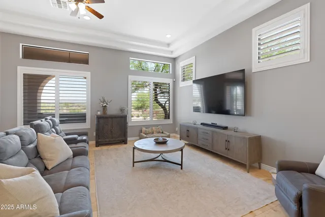 a white toilet sitting next to a shower curtain