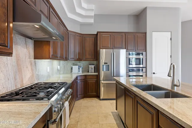 a bedroom with bed and window