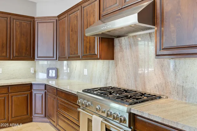a bathroom with a sink toilet and a mirror