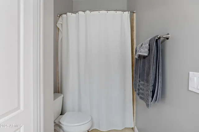 a view of a swimming pool and a yard