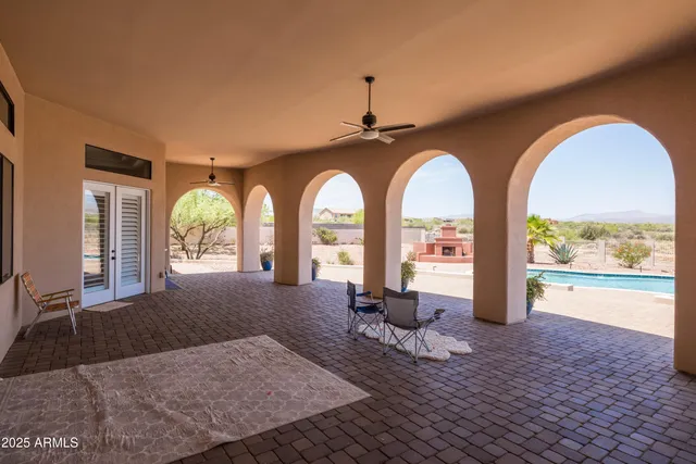 a view of a house with a snow in the yard