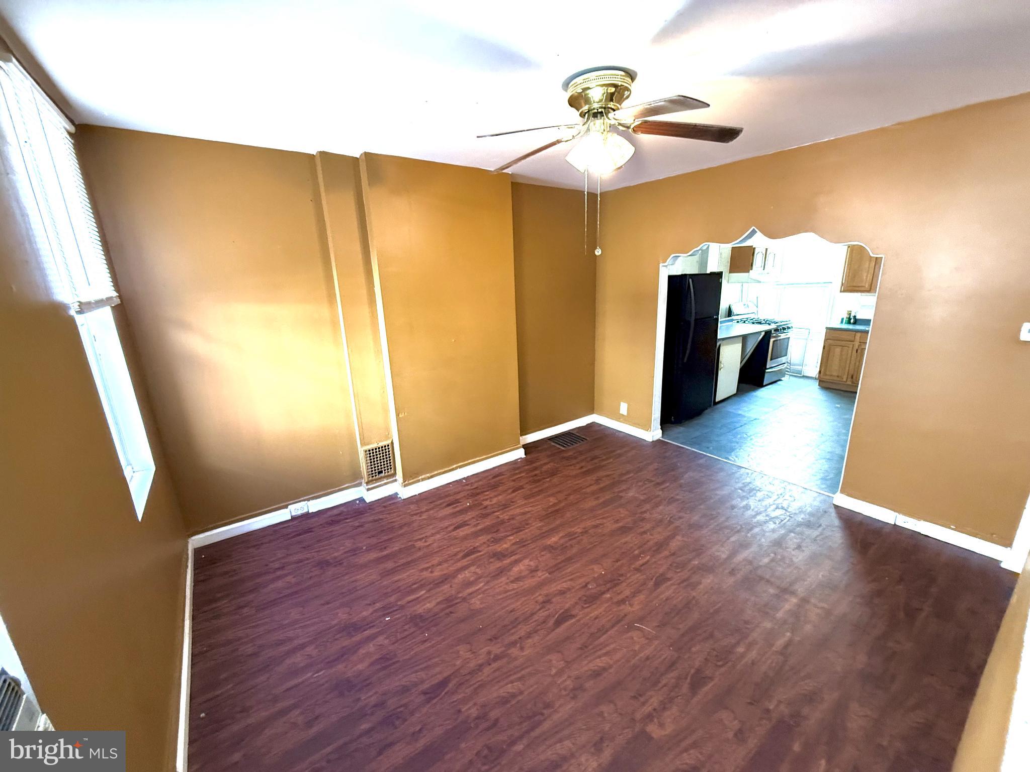 706 Dudley Street Philadelphia, PA 19148 - Photo 2 of 8 a view of a hallway with wooden floor