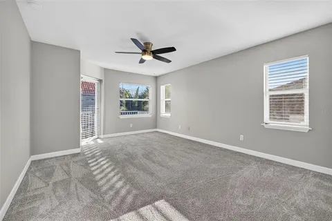 a view of swimming pool with a patio