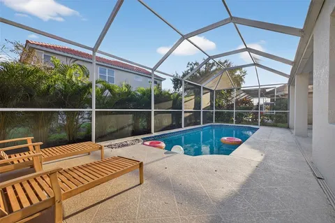 an aerial view of houses with yard