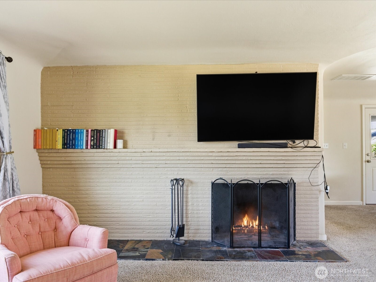 1417 Maple Street Sumner, WA 98390 - Photo 20 of 40 a living room with furniture and a fireplace