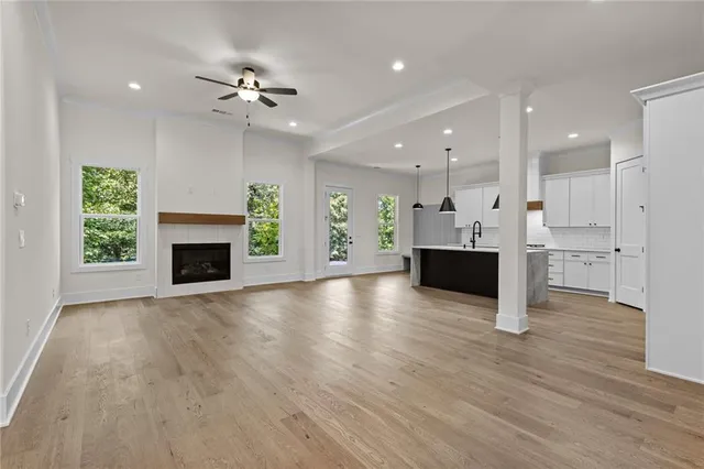 a view of a kitchen with furniture and a fireplace