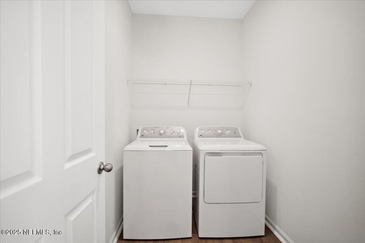 7212 Red Timber Road Jacksonville, FL 32244 - Photo 18 of 31 a utility room with dryer and washer