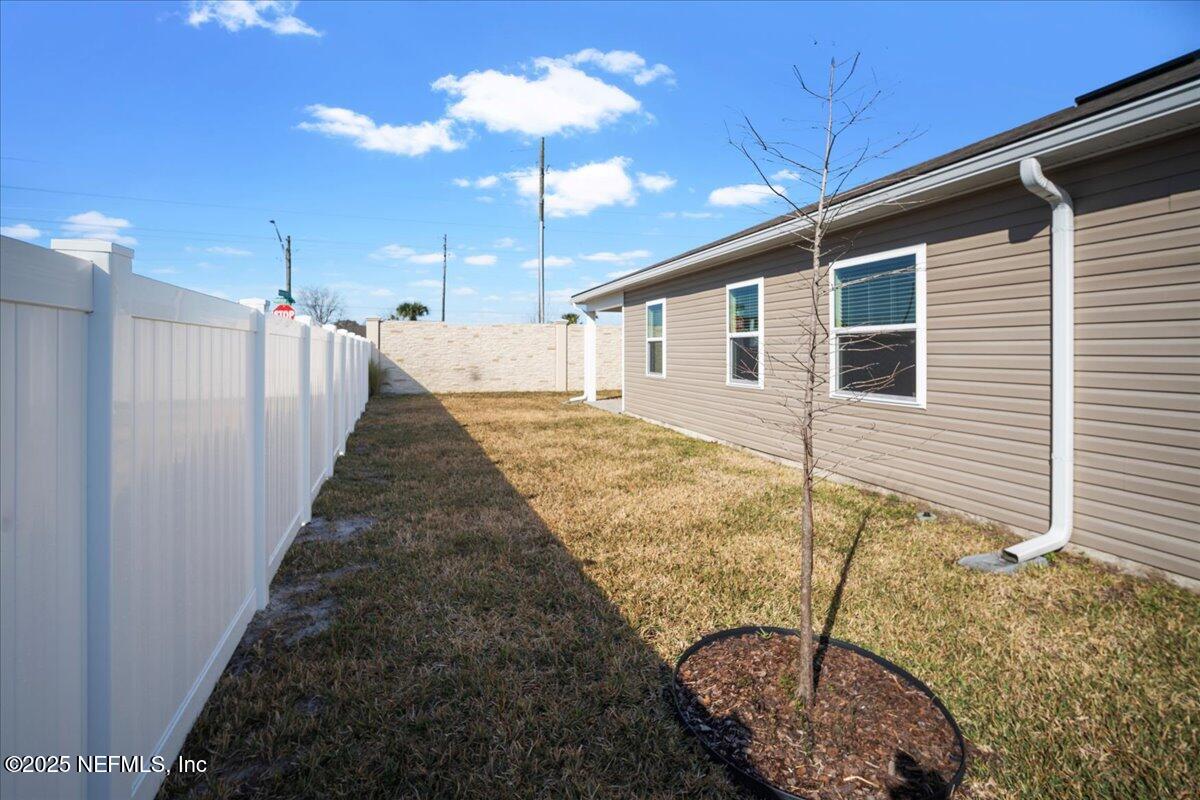 7212 Red Timber Road Jacksonville, FL 32244 - Photo 28 of 31 a view of a house with backyard