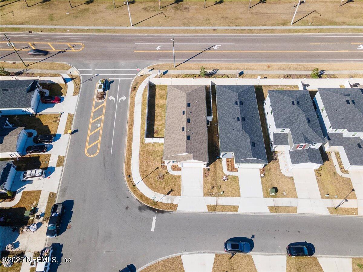 7212 Red Timber Road Jacksonville, FL 32244 - Photo 30 of 31 a view of walk in closet with clothes and shoes
