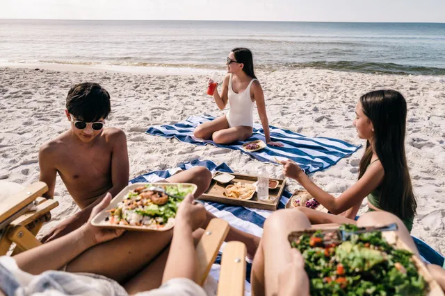 a view of a field with an ocean
