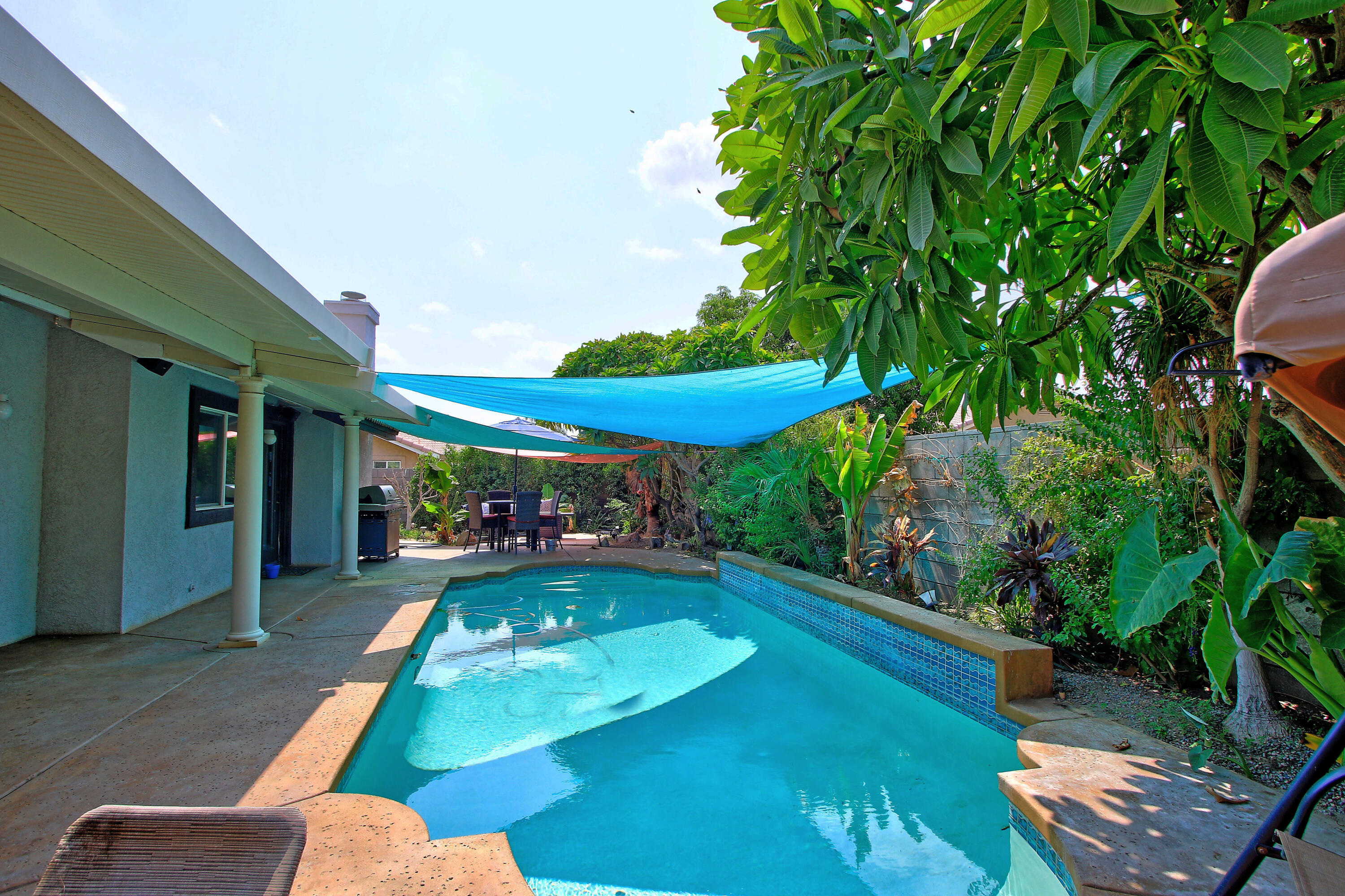 an outdoor space with swimming pool