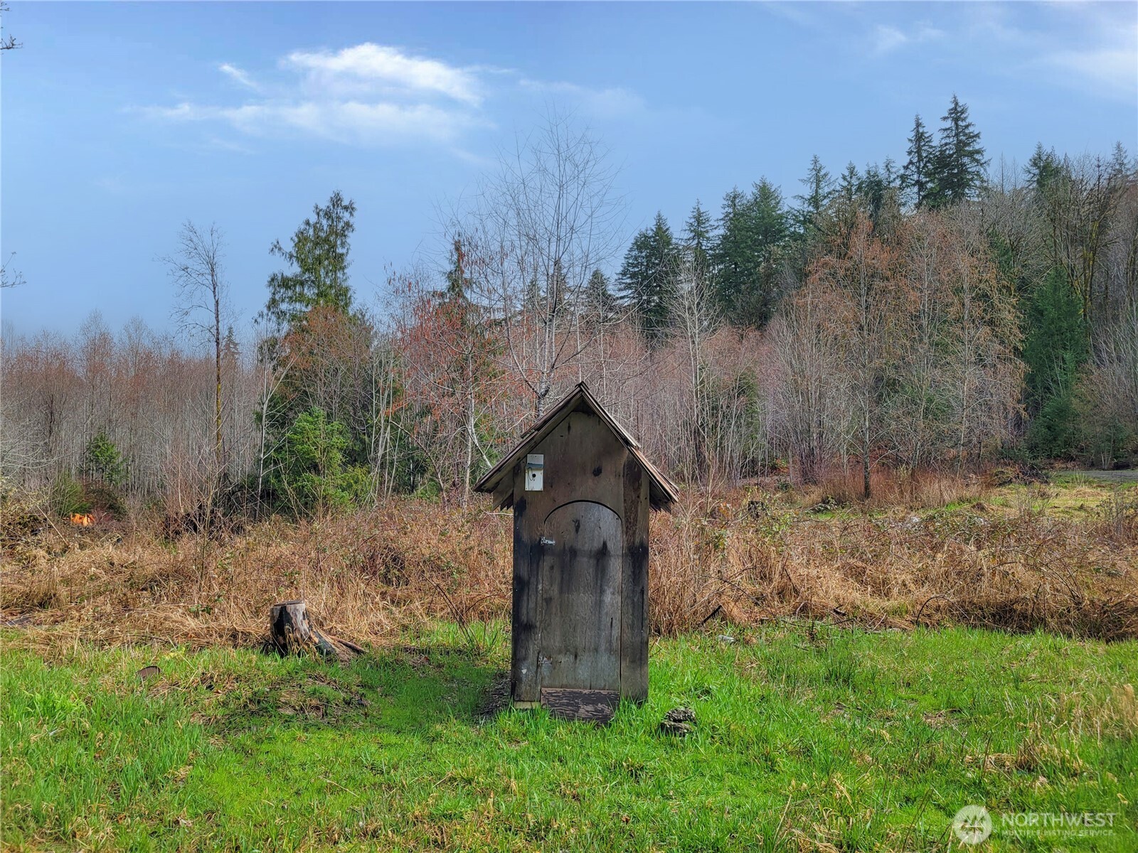 1840 West Deegan Road West Shelton, WA 98584 - Photo 16 of 24 a wooden fence with some trees in the background