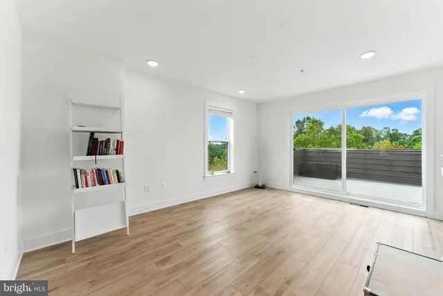 a view of a door and a window