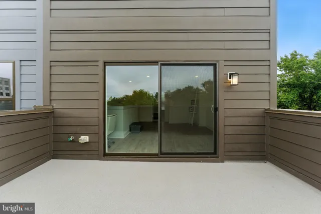 a view of a park with iron fence