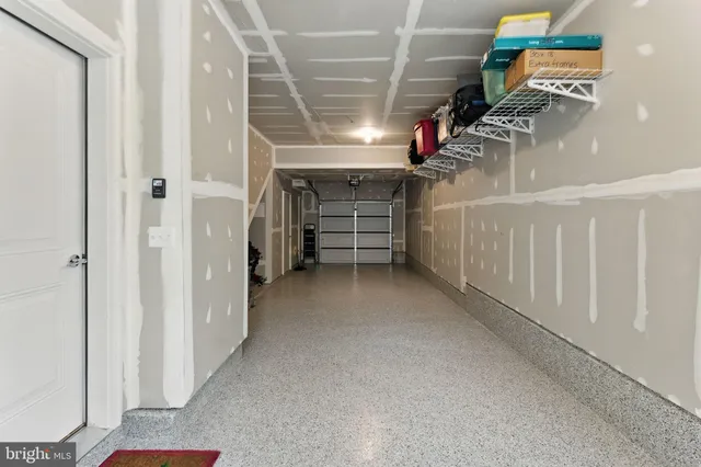 a view of a street with houses on both side