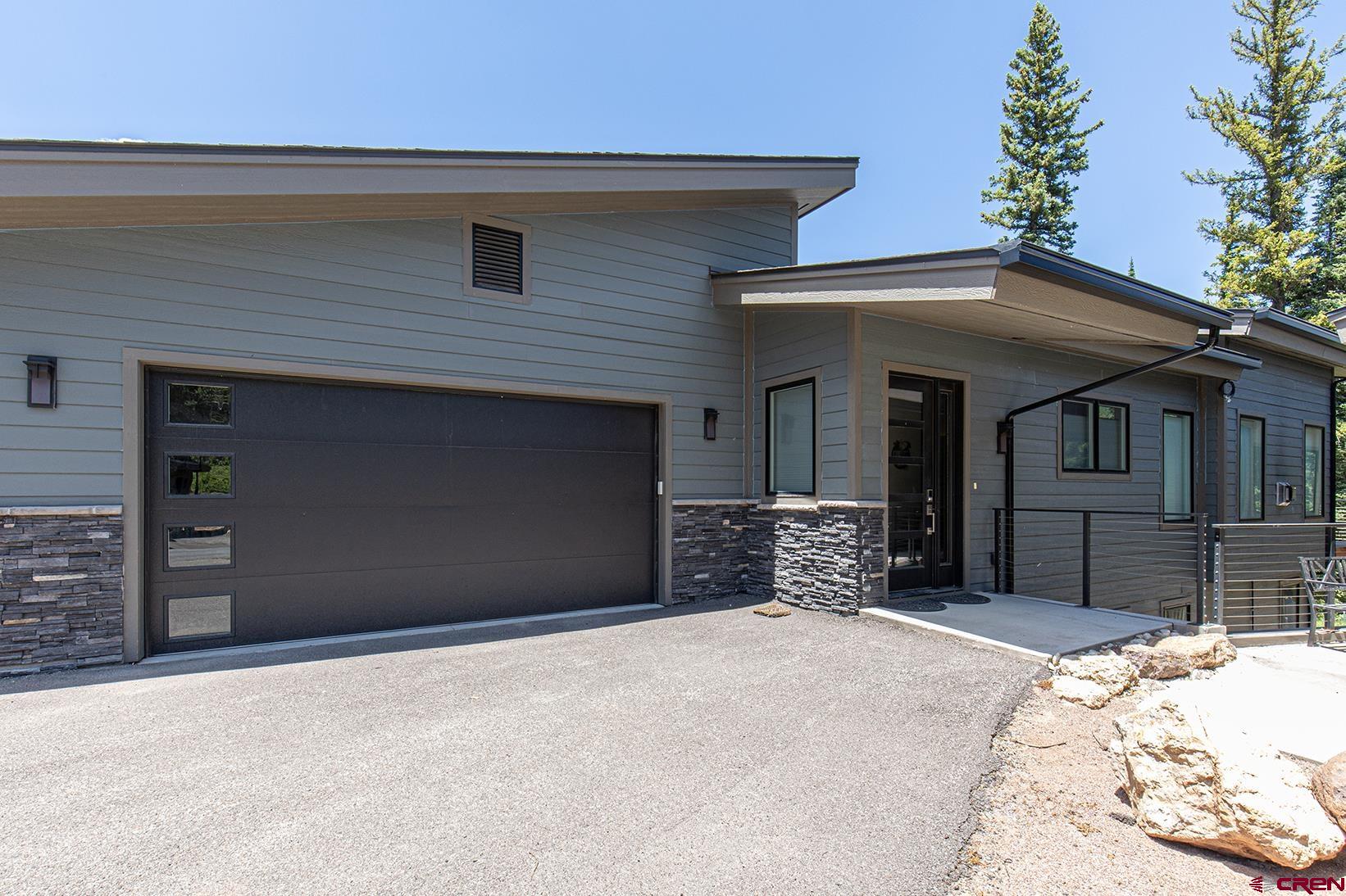 107 Tacoma Drive Durango, CO 81301 - Photo 2 of 29 a front view of a house