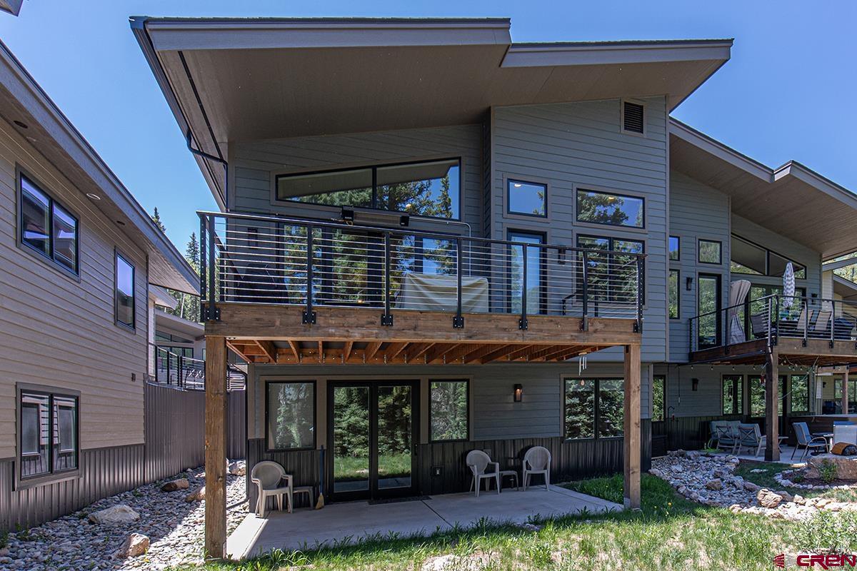 107 Tacoma Drive Durango, CO 81301 - Photo 23 of 29 a view of a house with backyard porch and sitting area