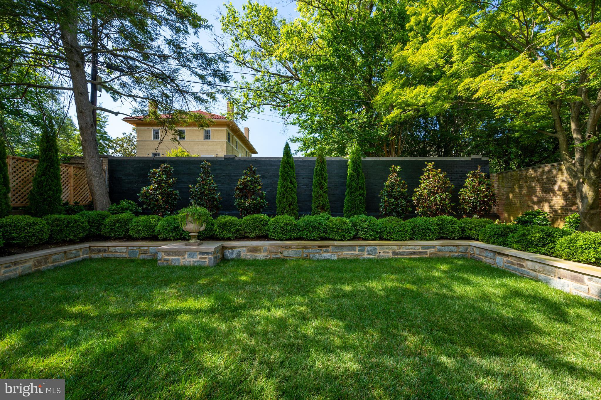 2302 Kalorama Road Northwest Washington, DC 20008 - Photo 33 of 35 Rear Garden with Stone Sitting Wall
