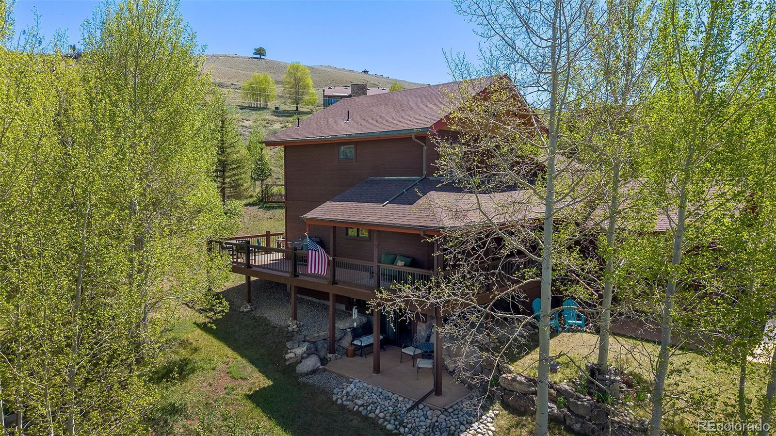 290 Village Road Granby, CO 80446 - Photo 44 of 45 a view of house with a yard and sitting area