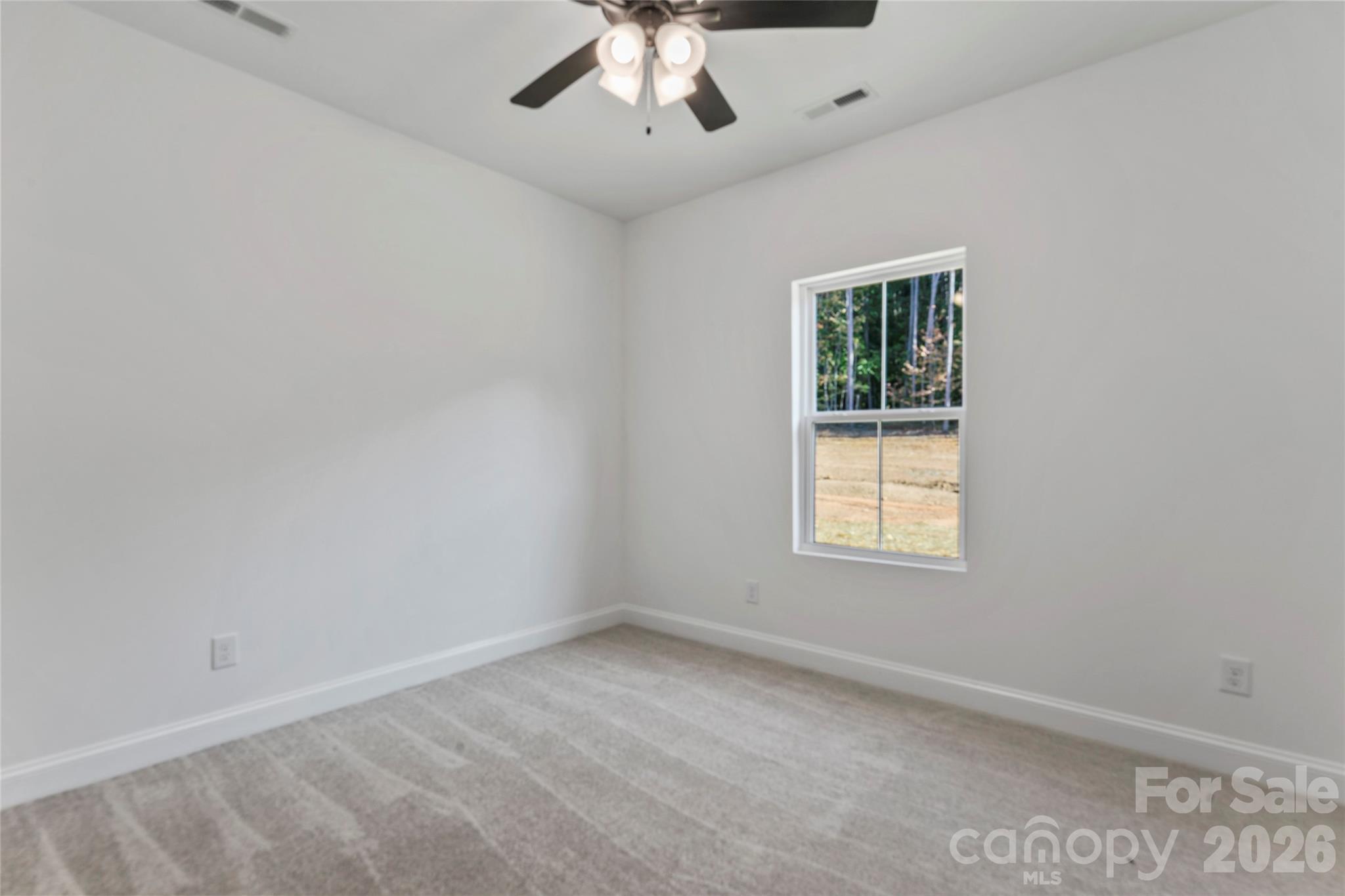 755 Mockingbird Road, Unit 3 Albemarle, NC 28001 - Photo 23 of 25 an empty room with a window