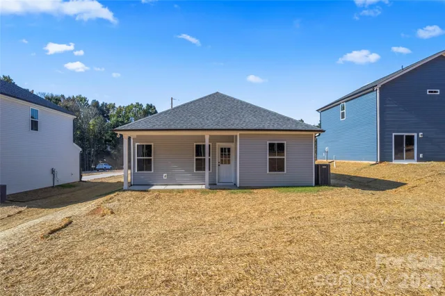 a house with yard in front of it