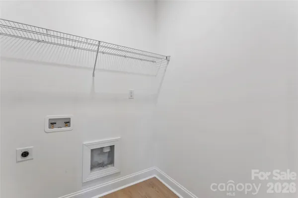 a view of small space with racks on the wall