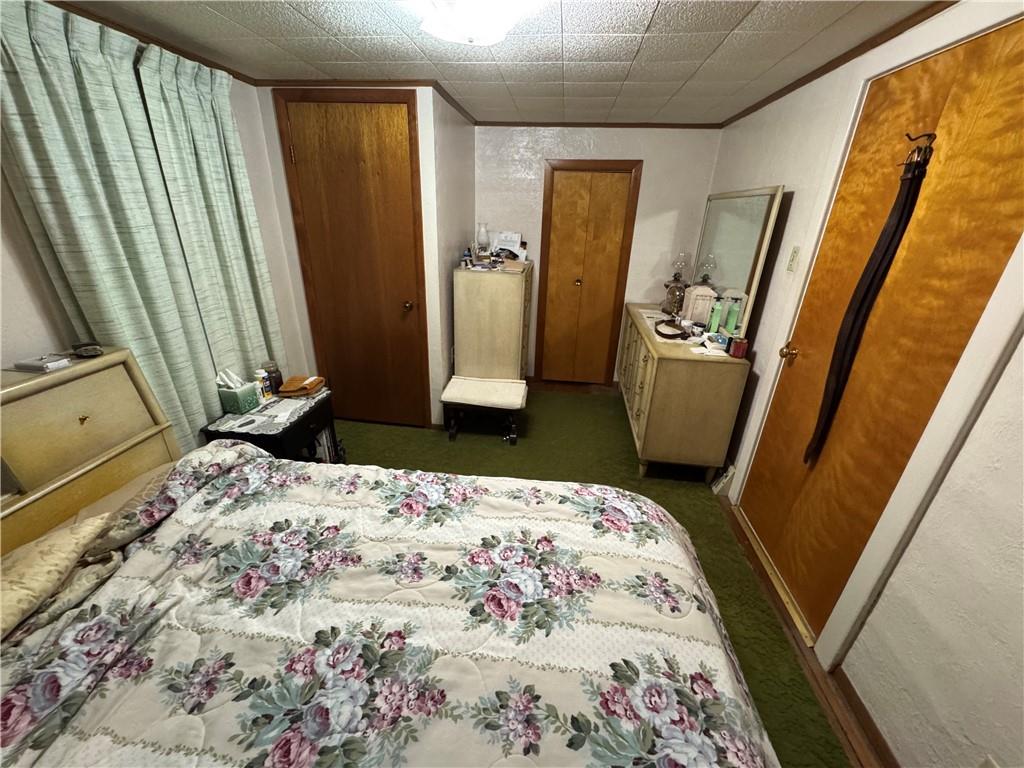 31 Orr Road West Newton, PA 15089 - Photo 13 of 48 a bedroom with a bed and wooden floor