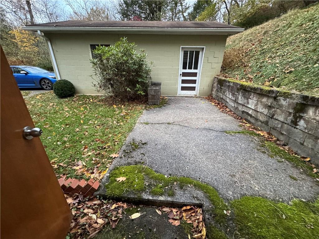 31 Orr Road West Newton, PA 15089 - Photo 22 of 48 a backyard of a house with outdoor seating and plants