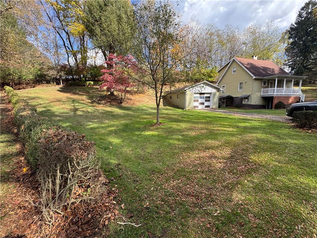31 Orr Road West Newton, PA 15089 - Photo 25 of 48 a front view of a house with a yard and garage
