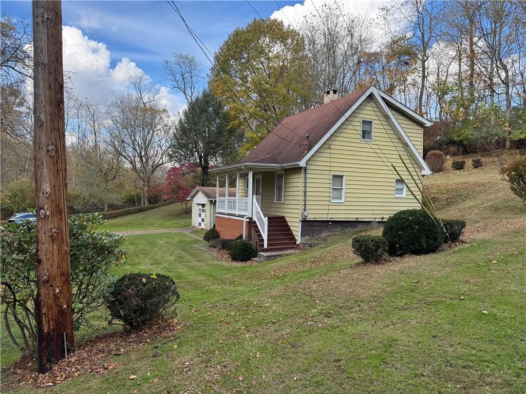 31 Orr Road West Newton, PA 15089 - Photo 29 of 48 a view of a house with a yard and a garden