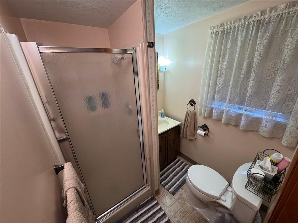 31 Orr Road West Newton, PA 15089 - Photo 5 of 48 a bathroom with a sink toilet and shower
