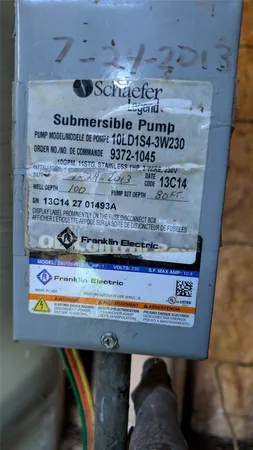 a wooden fence in front of a house