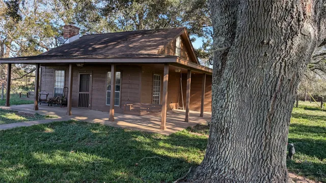 a view of a house with a small garden