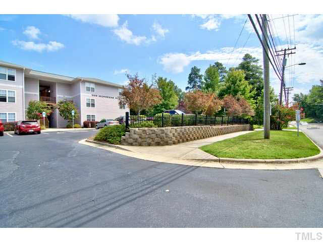 929 Morreene Road, Unit A24 Durham, NC 27705 - Photo 2 of 13 a view of a play ground in front of a house