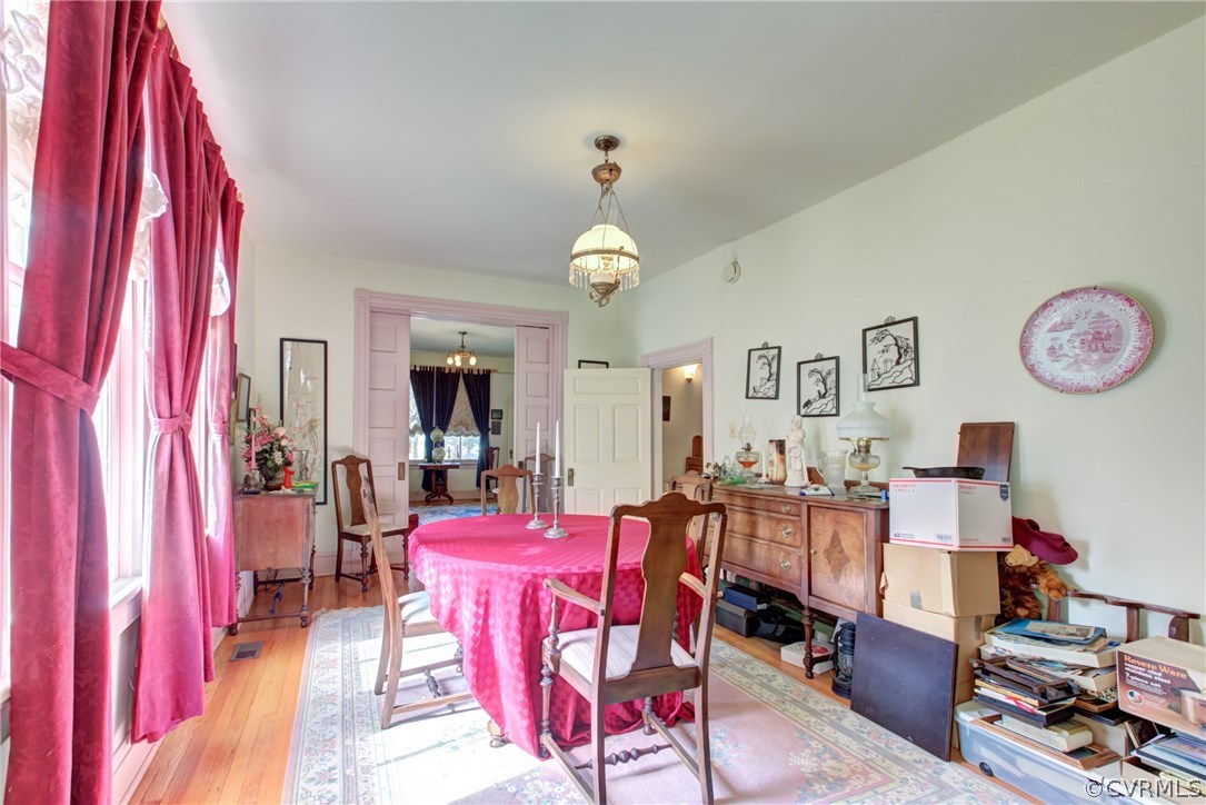 3048 River Road West Goochland, VA 23063 - Photo 12 of 49 a living room with furniture and a chandelier