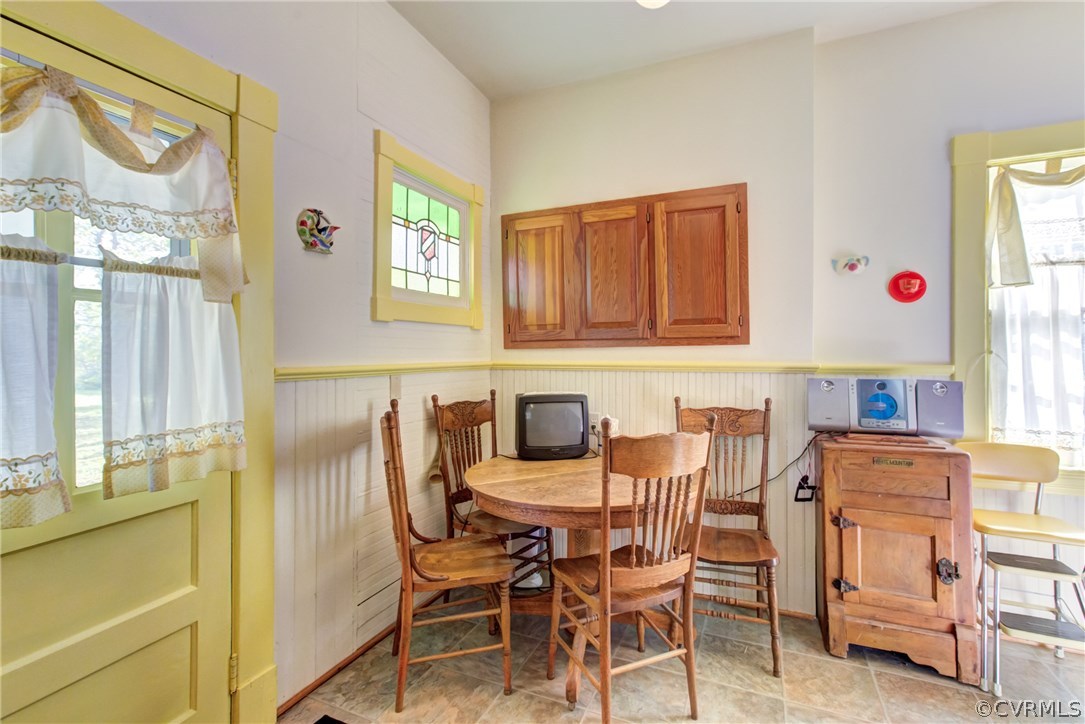 3048 River Road West Goochland, VA 23063 - Photo 18 of 49 a view of a dining room with furniture and a window