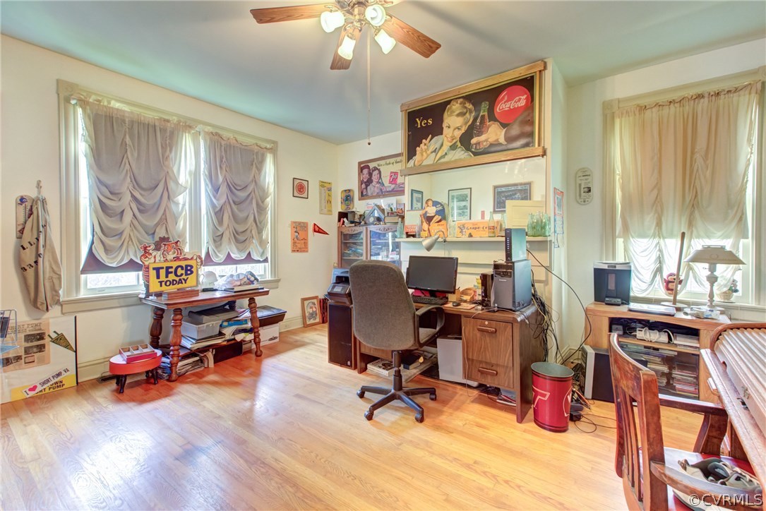 3048 River Road West Goochland, VA 23063 - Photo 21 of 49 a view of a workspace with furniture and a window