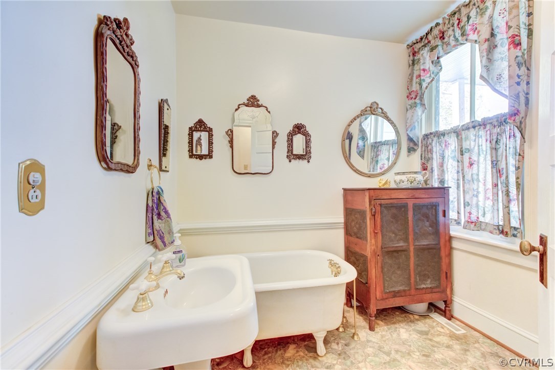 3048 River Road West Goochland, VA 23063 - Photo 25 of 49 a bathroom with a bathtub and a sink